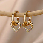 Hollow zircon heart earrings
