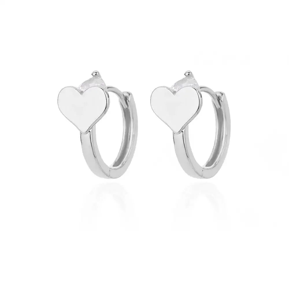 Hollow zircon heart earrings