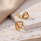 Hollow zircon heart earrings