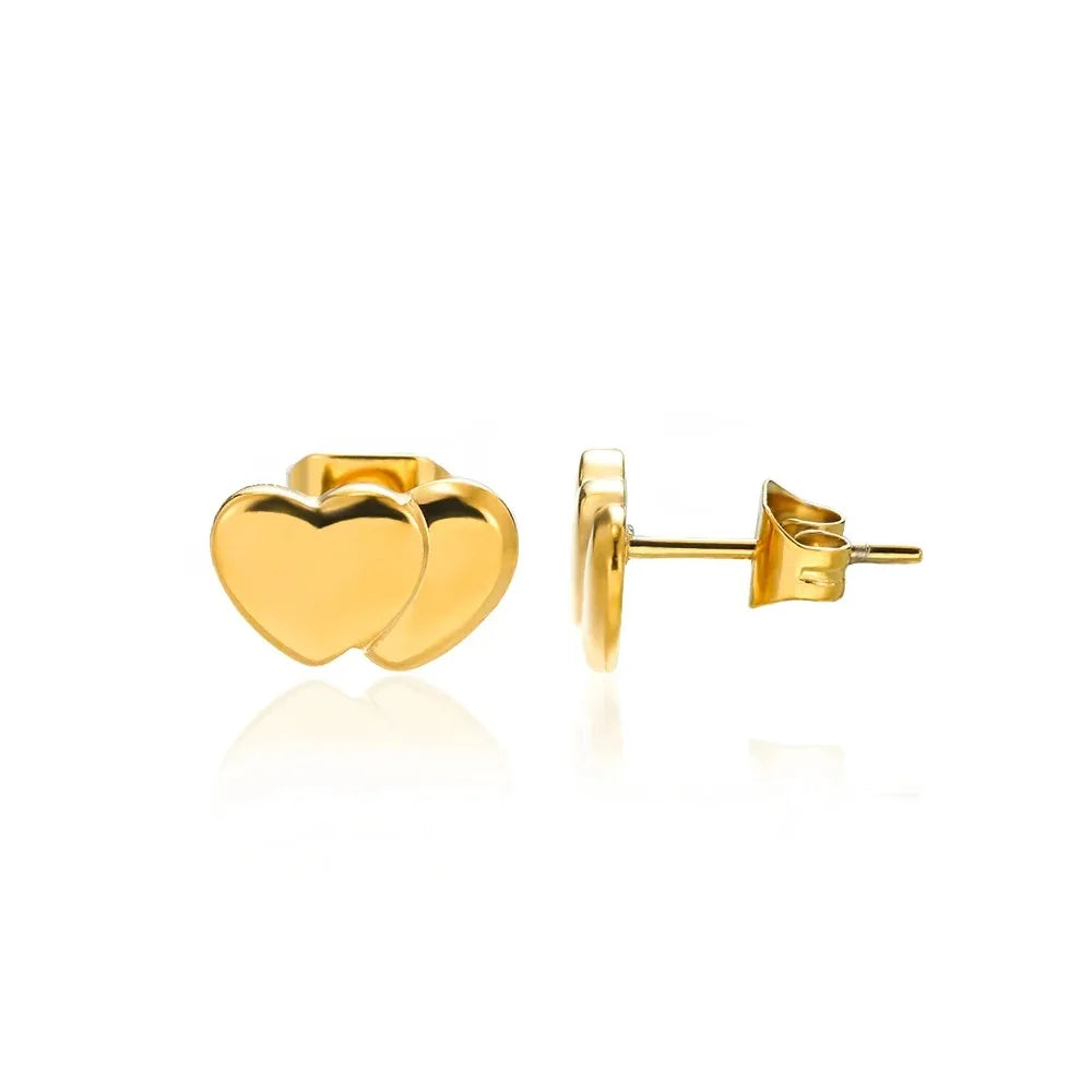 Hollow zircon heart earrings