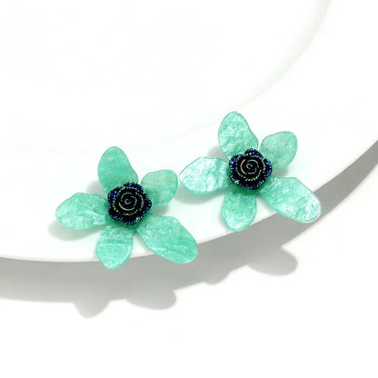 large flower statement earrings