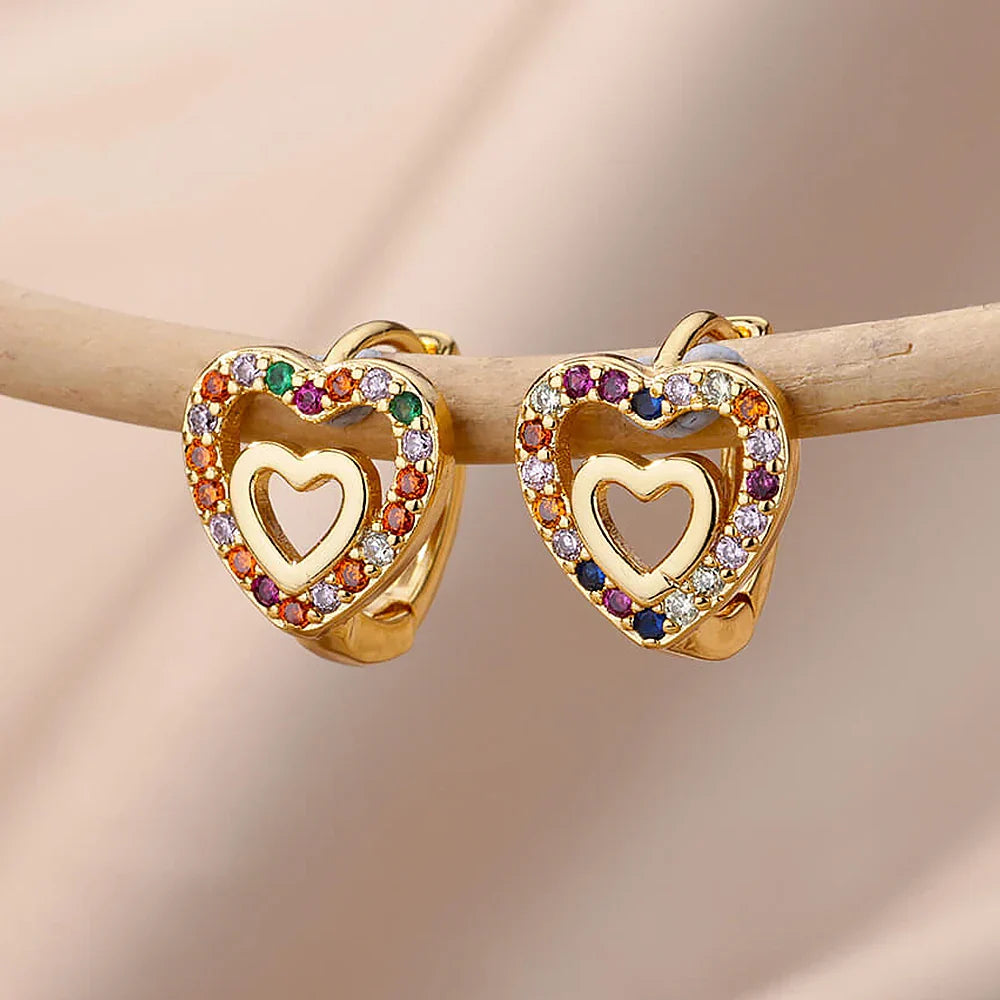 Hollow zircon heart earrings