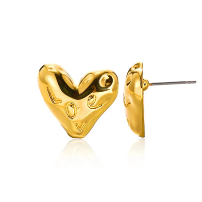 Hollow zircon heart earrings