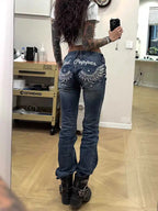 Zynvora Low-Rise Embroidered Skinny Jeans