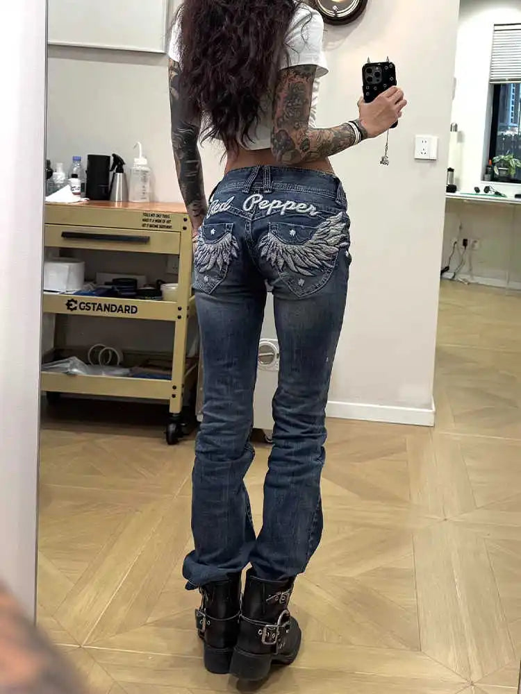 Zynvora Low-Rise Embroidered Skinny Jeans