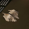 Elegant Gold Tassel Earrings