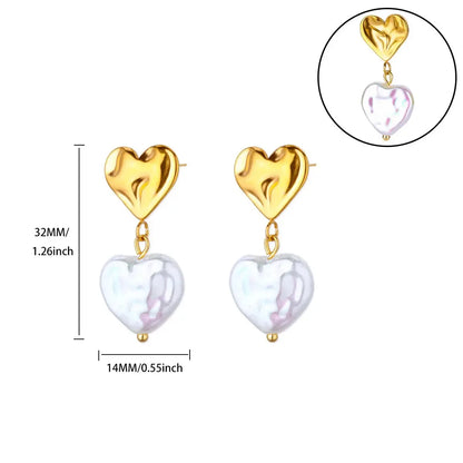Hollow zircon heart earrings