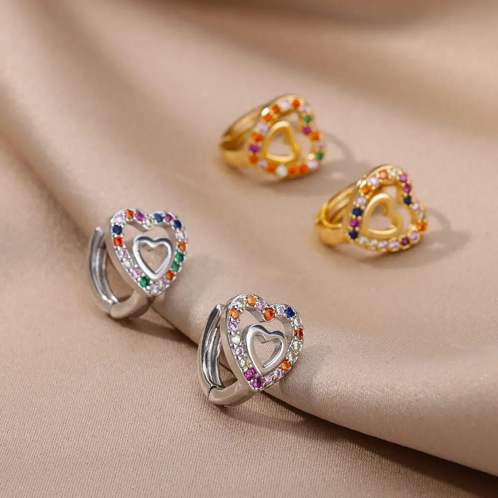 Hollow zircon heart earrings